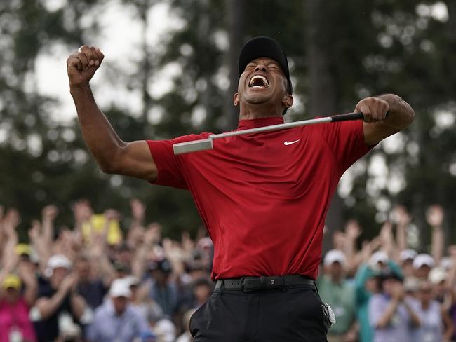 The moment Tiger Woods secured his fifth Green Jacket.