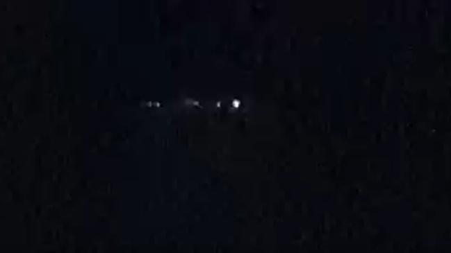 A strange line of lights in the sky over Cairns were spotted by dozens of people, leading to speculation it could be a RAAF military exercise or an extraterrestrial UFO visit. PICTURE: SUPPLIED