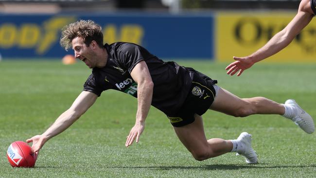 Richmond midfielder-forward Kane Lambert at full stretch during Tigers training. Picture: Michael Klein