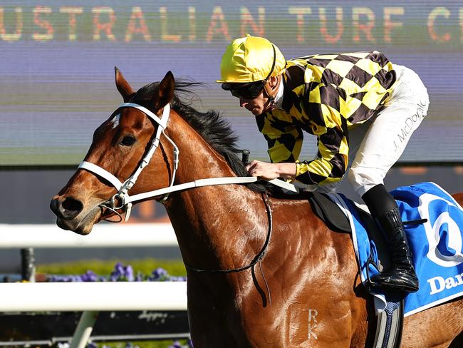 SYDNEY, AUSTRALIA - SEPTEMBER 21: James McDonald riding Autumn Glow wins Race 7 Darley Tea Rose Stakes during 