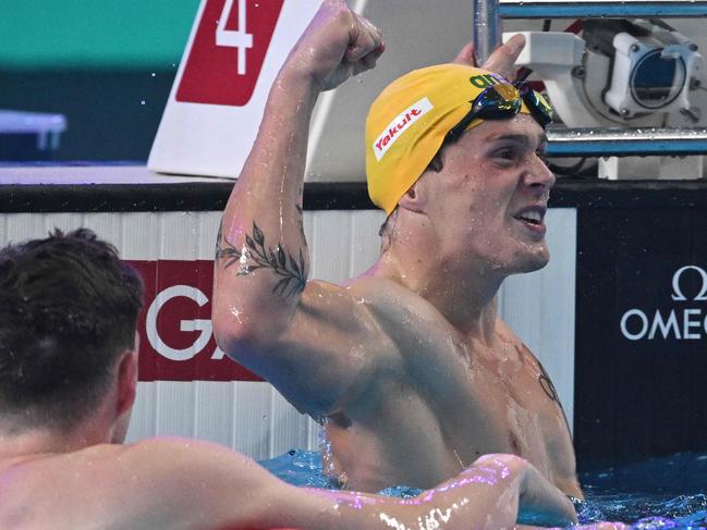 Isaac Cooper celebrates winning the final of the men's 50m backstroke. Picture: Oli Scarff/AFP