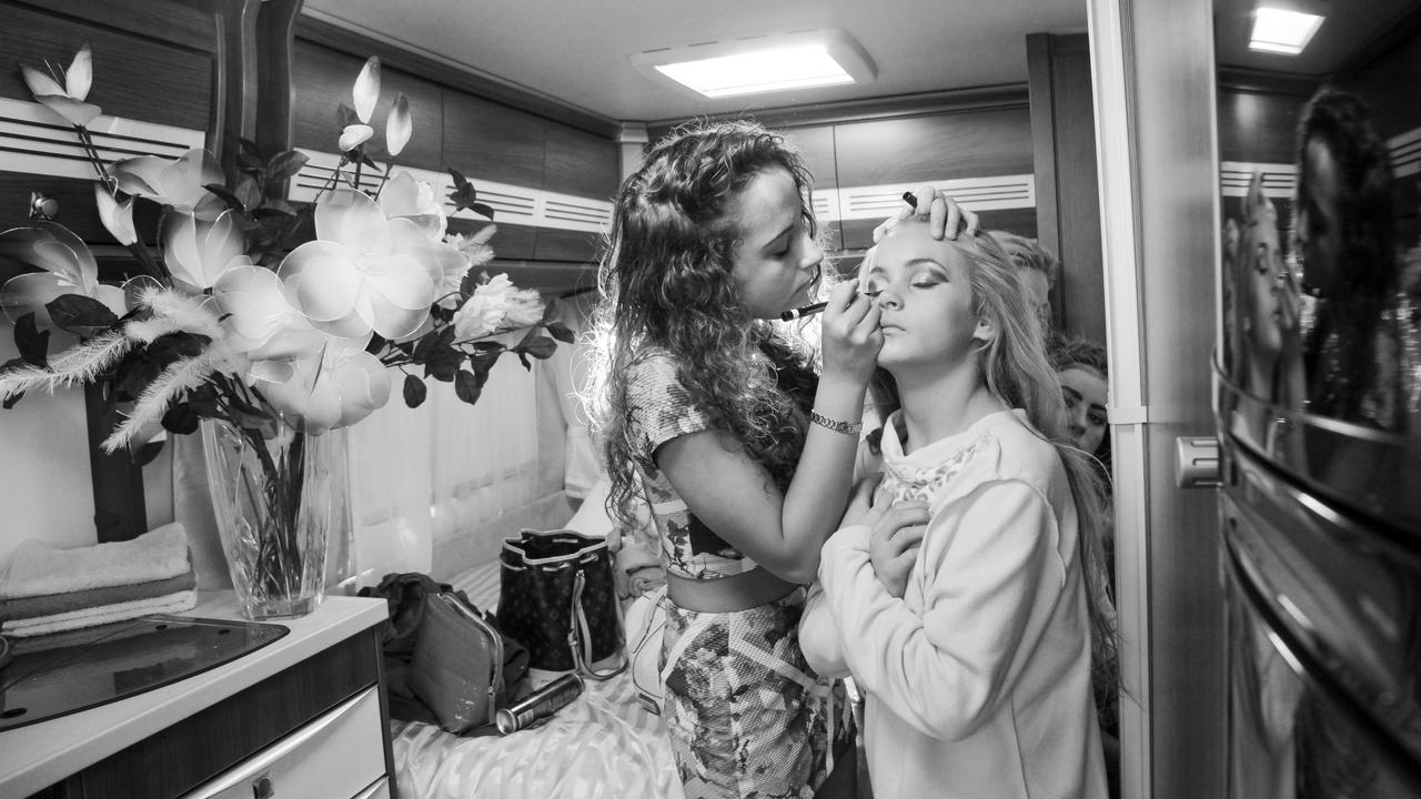 Two girls put make-up on. Picture: Jamie Johnson