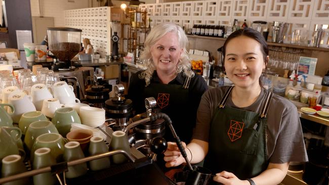 Nikki Chen with My Kingdom for a Horse cafe owner Emily Raven. Picture: NCA NewsWire / Kelly Barnes