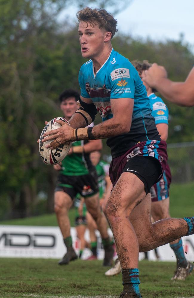 Joseph Doyle runs the ball for Mackay Cutters vs Townsville Blackhawks. Picture:Michaela Harlow