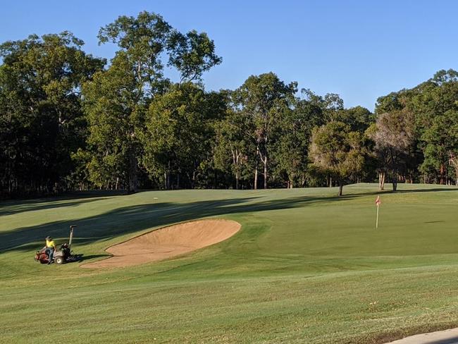 HARD YAKKA: Grafton District Golf Club groundskeepers have been hard at work keeping the course in pristine condition including the top-notch 10th hole.