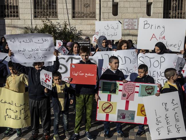 Supporters held signs saying “bring Aiia home.” Picture: Supplied