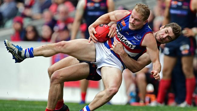 Norwood's Ed Smart lays a tackle on Central's Travis Schiller during last season’s elimination final. Picture: Tom Huntley