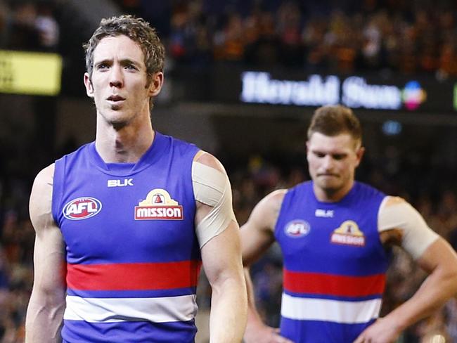 2nd Elimination Final. Western Bulldogs vs Adelaide at the MCG. Dissappointed Bulldogs players walk off the MCG . Pic: Michael Klein. Saturday September 12, 2015.