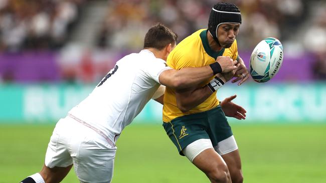 Christian Lealiifano coughs up possession. Picture: Getty Images