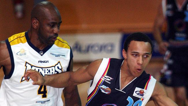 Ballarat Miners player Eric Hayes puts pressure on Hobart Chargers player Tiri Masunda. Picture: Sam Rosewarne