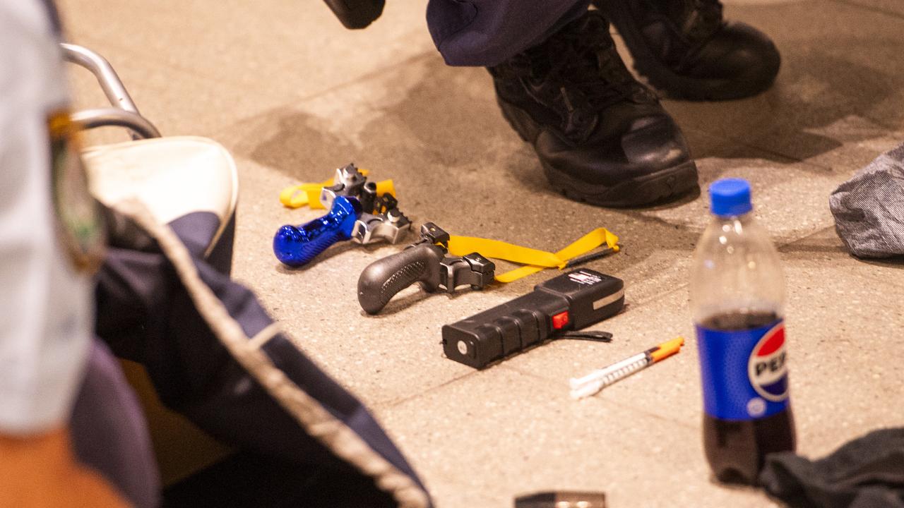 Slingshots, tasers and syringes were also seized by police. Picture: NewsWire / Jeremy Piper