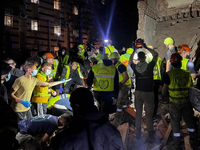 Emergency teams work at the site of an Israeli strike that targeted Zuqaq al-Blat neighbourhood in Beirut. Picture: AFP