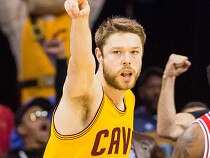 CLEVELAND, OH - MAY 12: Matthew Dellavedova #8 of the Cleveland Cavaliers celebrates after scoring in the second half against the Chicago Bulls during Game Five in the Eastern Conference Semifinals of the 2015 NBA Playoffs 2015 at Quicken Loans Arena on May 12, 2015 in Cleveland, Ohio. The Cavaliers defeated the Bulls 106-101. NOTE TO USER: User expressly acknowledges and agrees that, by downloading and or using this photograph, User is consenting to the terms and conditions of the Getty Images License Agreement. (Photo by Jason Miller/Getty Images)