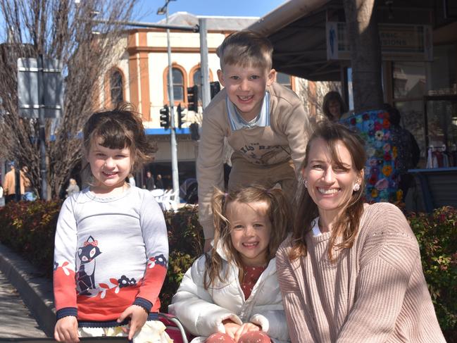 Liza, Levi, Grace, and Stina Gabriel-Gray showing off their Evergreen at Sea designs, which were for sale during the suitcase rummage at Jumpers and Jazz in July. Photo: Jessica Paul / Warwick Daily News