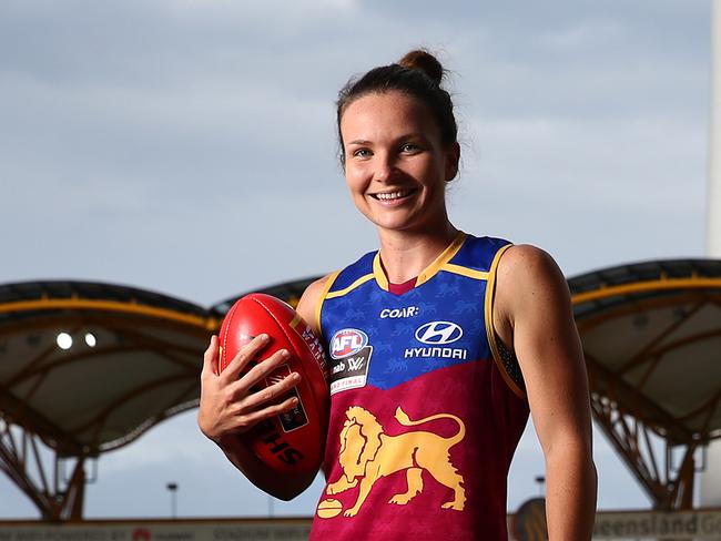 Emily Bates and the Brisbane Lions AFLW have their Captains run at Metricon Stadium. Pics Adam Head