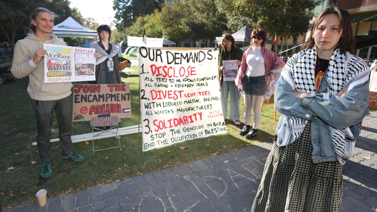 Bree Symonds (right) with student activists at the Adelaide University Gaza solidarity encampment. The young protester said the attack left students ‘on high alert’. Picture: NCA NewsWire / Dean Martin