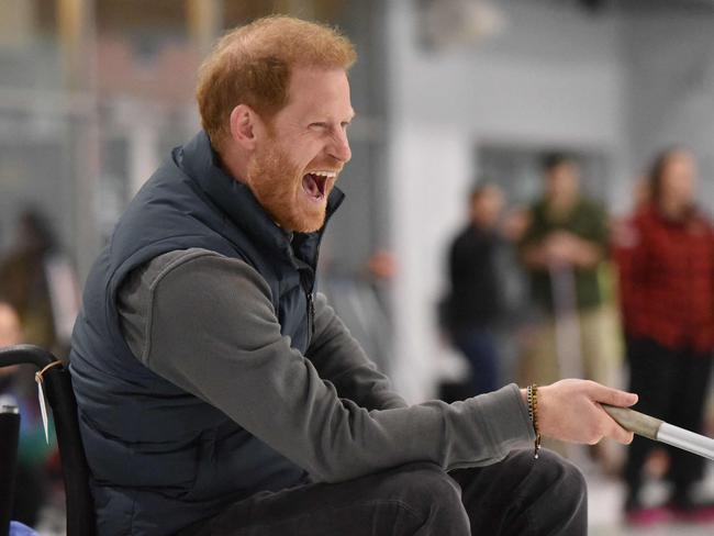 Britain's Prince Harry, Duke of Sussex, takes a shot during a wheelchair curling demonstration at the Invictus Games Vancouver Whistler 2025's One Year to Go winter training camp. Picture: Don MacKinnon / AFP