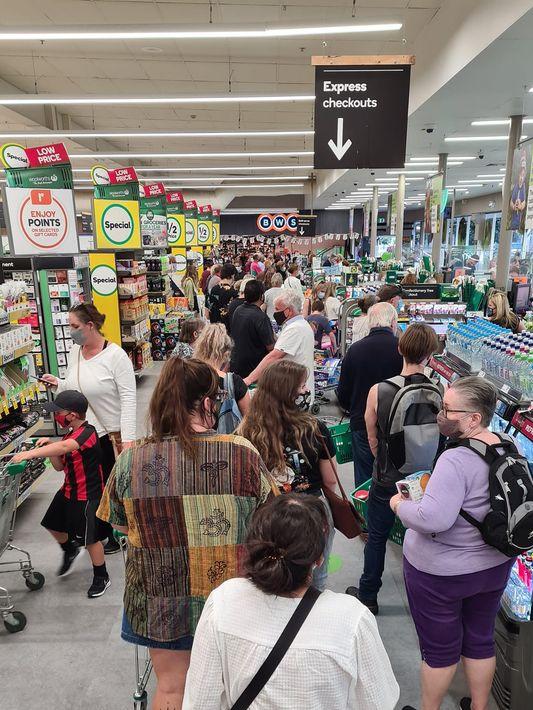 A person jokingly offered to sell their spot in this Woolworths queue on the Coffs Coast. Picture: Aub Thompson