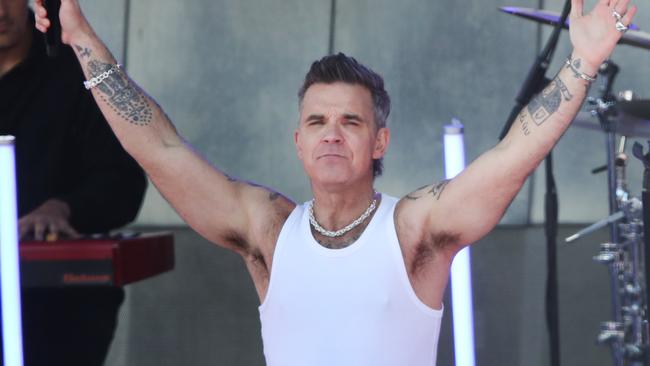 Entertainer Robbie Williams held a free mini concert at Federation Square Melbourne as part of his publicity tour for the movie Better Man. Picture: NewsWire/ David Crosling