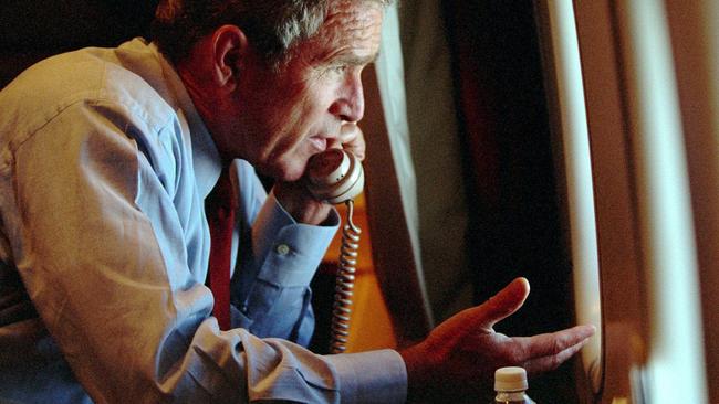 Then-US President George W Bush speaks to vice president Cheney by phone aboard Air Force One after departing Offutt air force Base in Nebraska following the terrorist attacks.