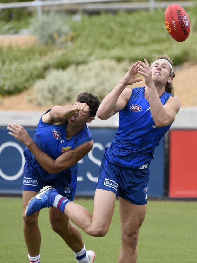 Aaron Naughton and James O'Donnell compete. Picture: Andrew Henshaw