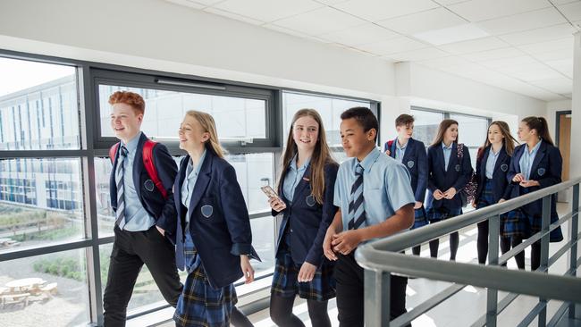 High school students walking to their next class.