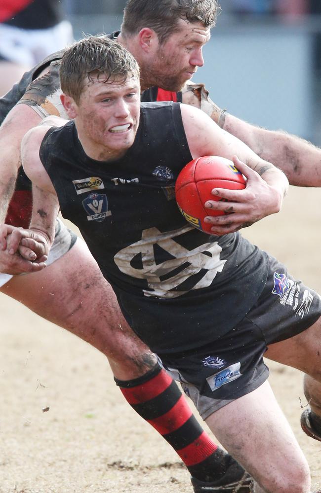 Football GFL: St Albans v Newtown &amp; Chilwell. Action, coaches and crowd.St Albans 25 Harley Cobb has Newtown &amp; Chilwell 9 Matthew Mcmahon tacklingPicture: Mark Wilson