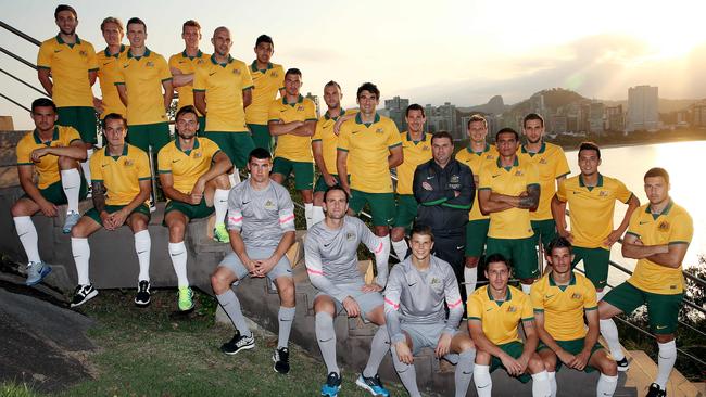 Galekovic (front row, fifth from right) won eight caps for the Socceroos. Picture: George Salpigtidis