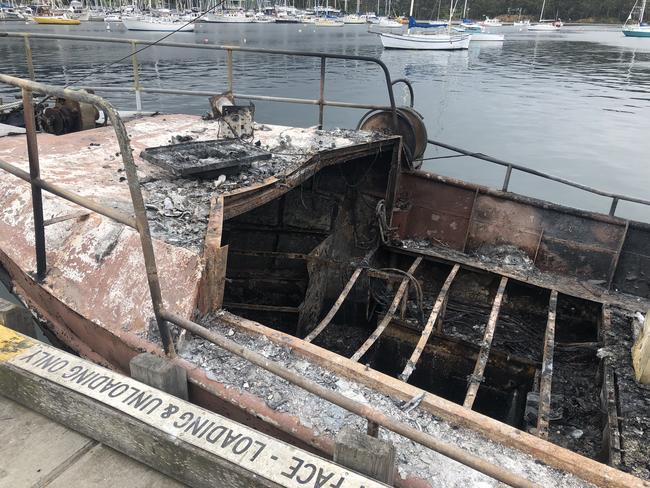 Overnight fire on a boat near Port Arthur that was towed to Kettering. Picture: MATT THOMPSON