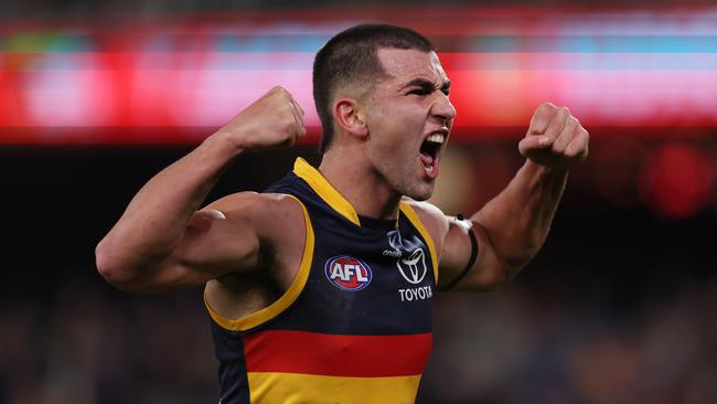 ADELAIDE, AUSTRALIA - JUNE 29: Josh Rachele of the Crows celebrates a goal during the 2024 AFL Round 16 match between the Adelaide Crows and the GWS GIANTS at Adelaide Oval on June 29, 2024 in Adelaide, Australia. (Photo by James Elsby/AFL Photos via Getty Images)
