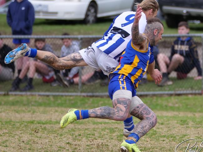 Somerville's Ryan Gillis and Langwarrin's Shane Paterson battle for the ball. Picture Paul Stanley Churcher