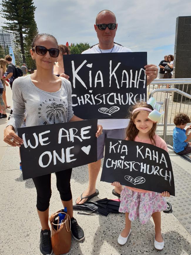 Jo, Jason and Sofia Allender came to the Haka performance at Surfers Paradise today to show their support for those affected by the Christchurch attacks. Picture: Alexandra Bernard. 