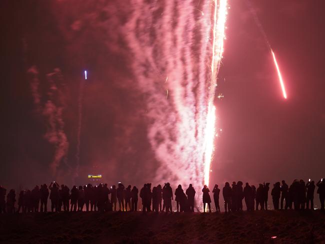 People gather on Everton Brow to watch unofficial fireworks and welcome 2021 on January 01, 2021 in Liverpool, United Kingdom. Picture: Getty