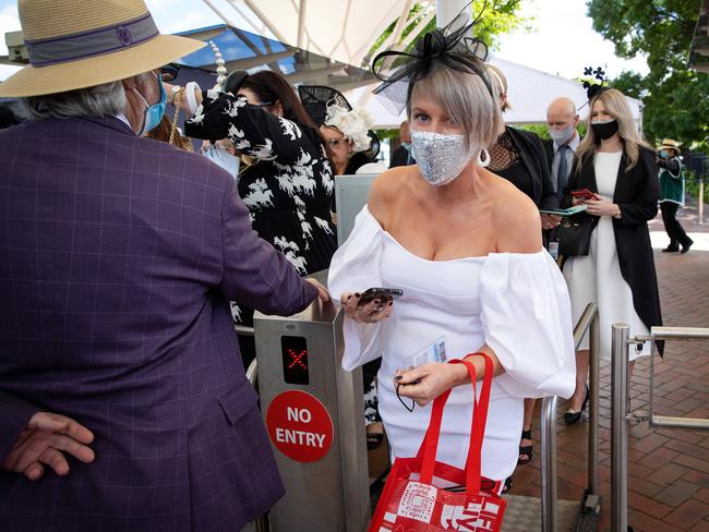 Fans at the gates of Flemington Racecourse once again. Picture: Mark Stewart