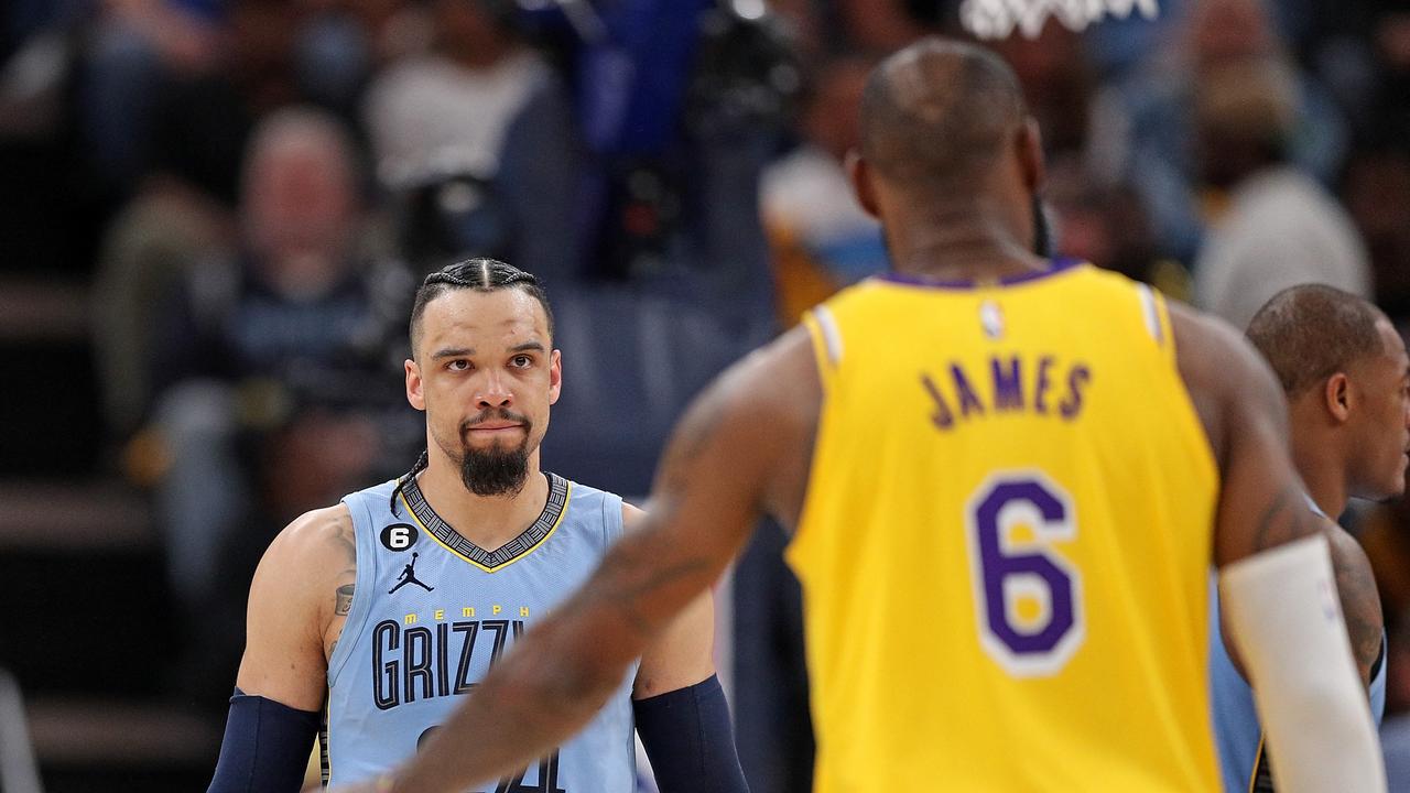 MEMPHIS, TENNESSEE - APRIL 26: Dillon Brooks #24 of the Memphis Grizzlies looks at LeBron James #6 of the Los Angeles Lakers during the second half of Game Five of the Western Conference First Round Playoffs at FedExForum on April 26, 2023 in Memphis, Tennessee. NOTE TO USER: User expressly acknowledges and agrees that, by downloading and or using this photograph, User is consenting to the terms and conditions of the Getty Images License Agreement. Justin Ford/Getty Images/AFP (Photo by Justin Ford / GETTY IMAGES NORTH AMERICA / Getty Images via AFP)