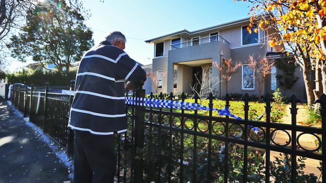 A 72-year-old man outside a Hawthorn East home where he was attacked after a wild house party. Picture: Aaron Francis (The Australian)