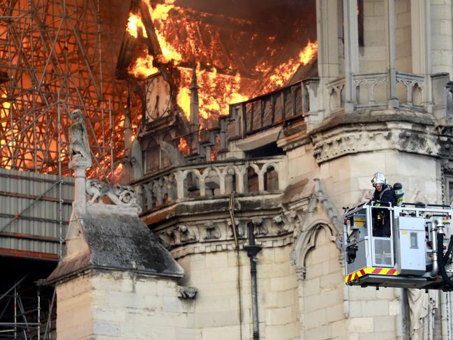 A firefighter is seen fighting the flames at Notre-Dame Cathedral April 15, 2019 in Paris, France.(Photo by Pierre Suu/Getty Images)