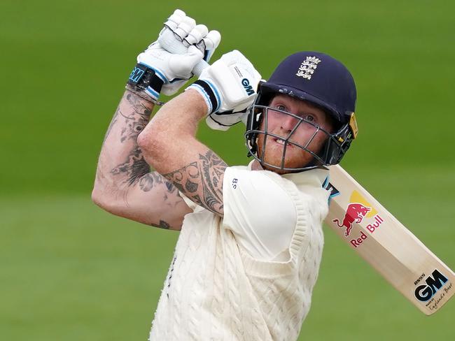 (FILES) In this file photo taken on July 20, 2020 England's Ben Stokes watches his shot clear the boundary for six during play on the final day of the second Test cricket match between England and the West Indies at Old Trafford in Manchester, northwest England. - England allrounder Ben Stokes has dedicated his biggest Indian Premier League innings for Rajasthan Royals to his father who is battling cancer in New Zealand. (Photo by Jon Super / POOL / AFP) / RESTRICTED TO EDITORIAL USE. NO ASSOCIATION WITH DIRECT COMPETITOR OF SPONSOR, PARTNER, OR SUPPLIER OF THE ECB