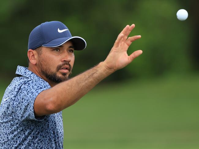 ORLANDO, FLORIDA - MARCH 05: Jason Day of Australia catches a golf ball on the driving range during the final round of the Arnold Palmer Invitational presented by Mastercard at Arnold Palmer Bay Hill Golf Course on March 05, 2023 in Orlando, Florida. (Photo by Sam Greenwood/Getty Images)