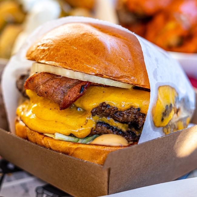 The single burger with fried cheese and beef. Picture: @goodfoodieguide