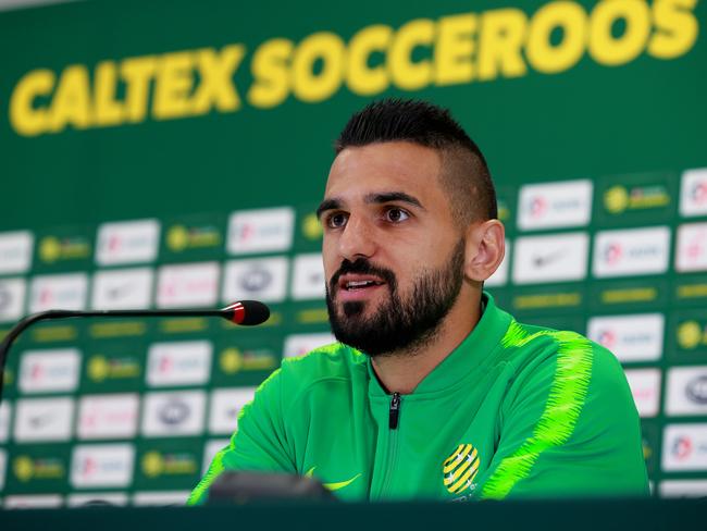 A quietly confident Aziz Behich addresses the press in Kazan. Picture: Toby Zerna