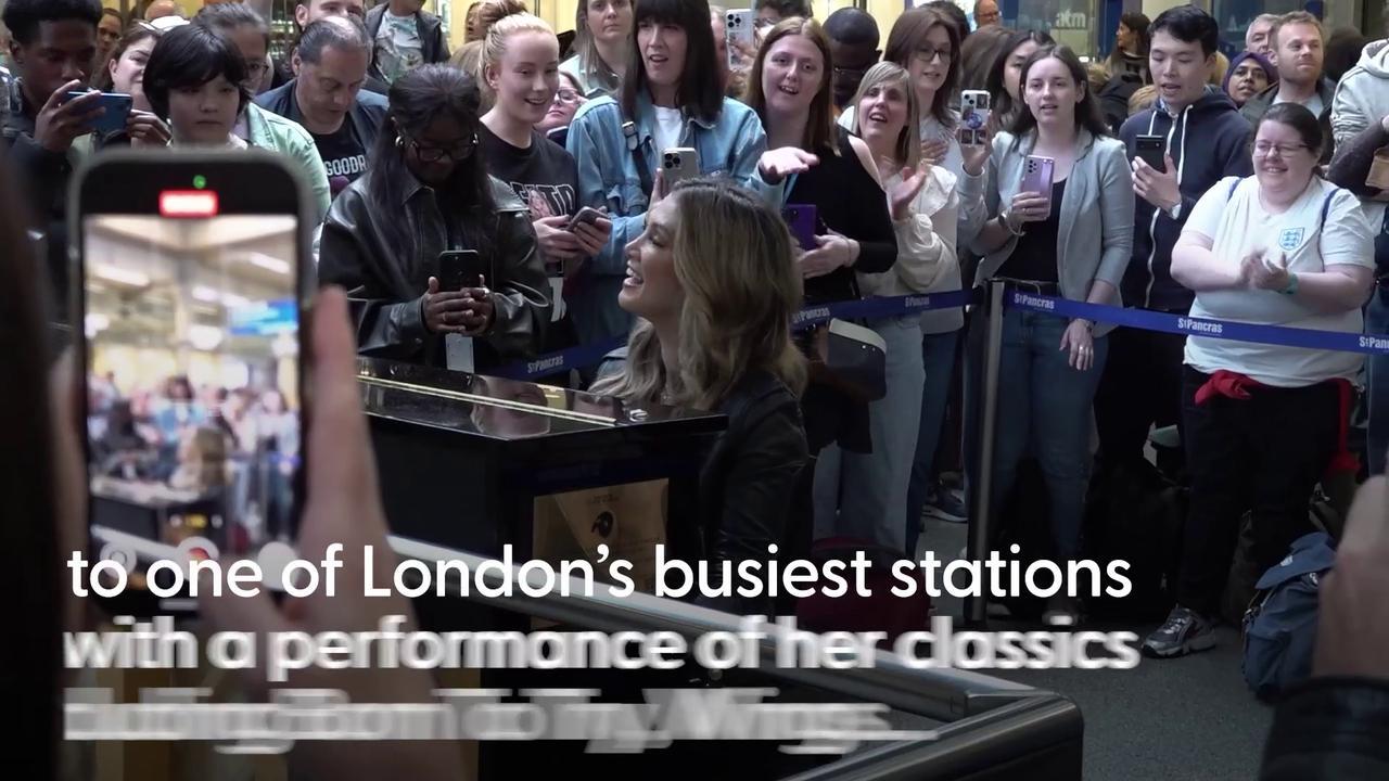Delta Goodrem surprises commuters with a piano performance at St Pancras