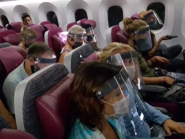 Qatar Airways requires face shields for every economy-class passenger.