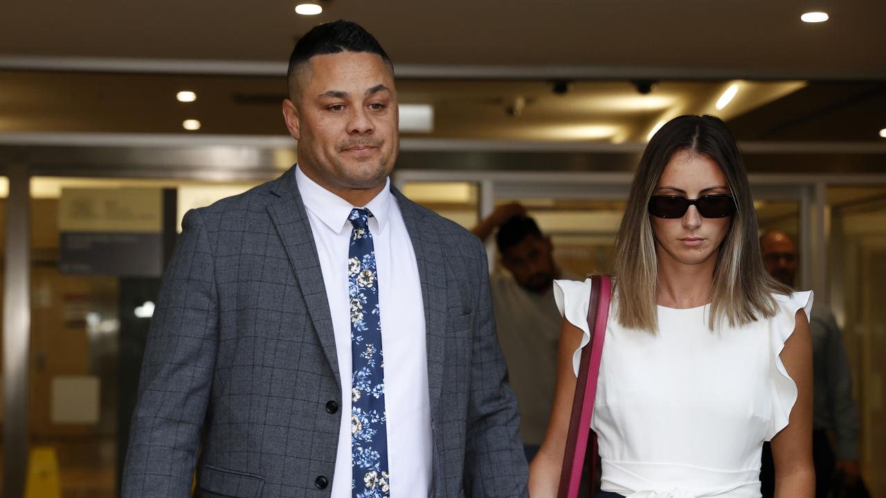 Hayne leaves court with his wife, Amellia. Picture: Jonathan Ng