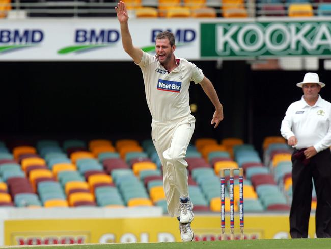 Swan, playing for Queensland in 2010, celebrates the wicket of Western Australia’s Marcus North.