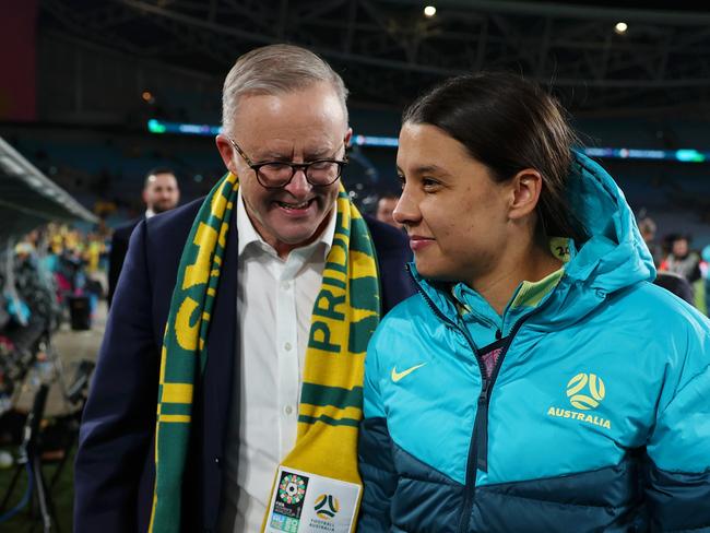 Prime Minister Anthony Albanese and injured Matildas star Sam Kerr. Picture: FIFA/Getty Images