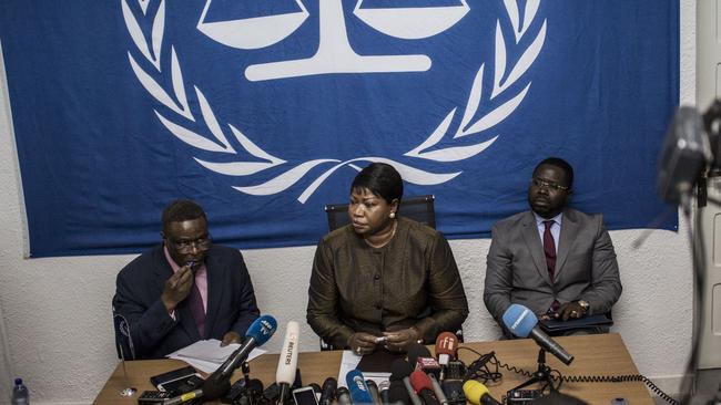 International Criminal Court's chief prosecutor Fatou Bensouda (C) holds a press conference.