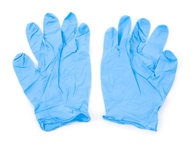 A study found coronavirus died quicker on surfaces such as paper, cloth and latex gloves. Picture: istock