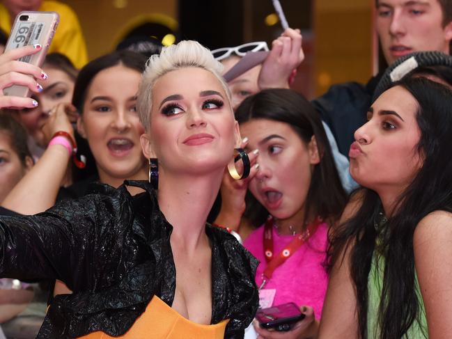 Myer in partnership with Westfield present global pop superstar Katy Perry live at Westfield Southland. Katy Perry chat to fans at Westfield Southland as part of the Australian leg of WITNESS: the Tour. Girls behind are (L-R) Pypah Webber, Myrah Bijelic and Kiona Maro (kissy face). Picture: Josie Hayden