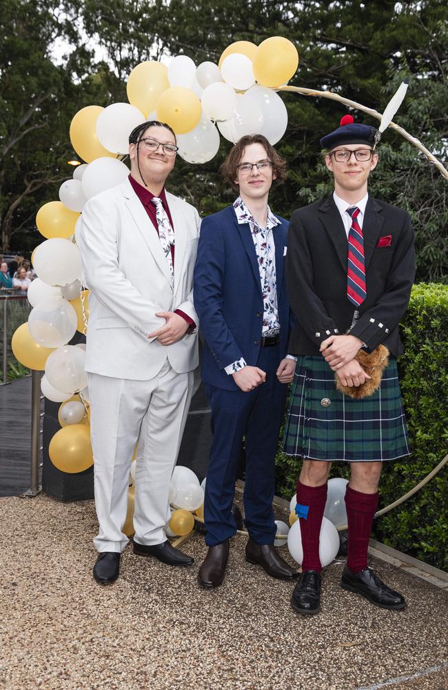 At Centenary Heights State High School formal are (from left) TJ Rademeyer, Zackary Rassmussen and Liam Scurr at Picnic Point, Friday, November 15, 2024. Picture: Kevin Farmer